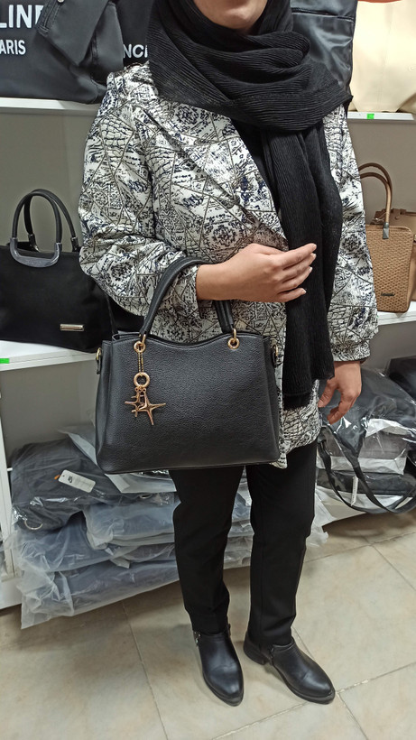 کیف زنانه مجلسی ستاره دار مشکی چرم مصنوعی سایز متوسط