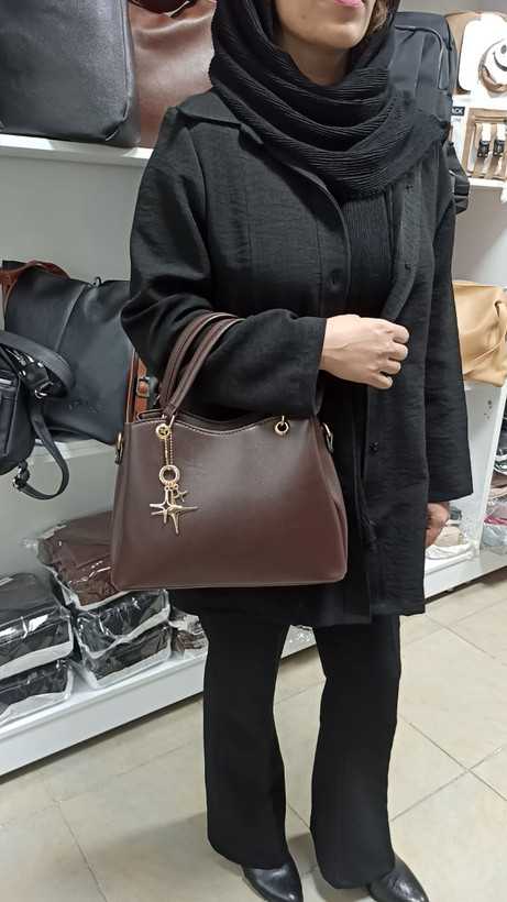 کیف زنانه مجلسی ستاره دار مشکی چرم مصنوعی سایز متوسط